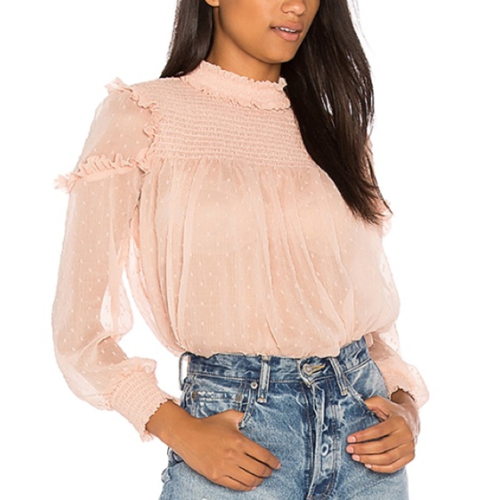 Smoked ruffle swiss dot blouse in nude pink!